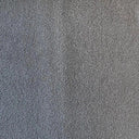 Närbild av ljusgrått möbeltyg Mimmi i 100 % polyester med tät, mjuk struktur. Slitstarkt tyg för möbler och inredningsdetaljer.