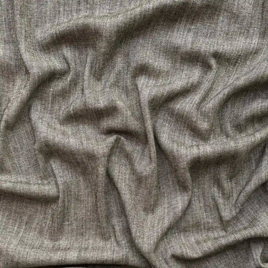 Närbild på Nova gardintyg i polyester, viskos och lin med strukturerad väv