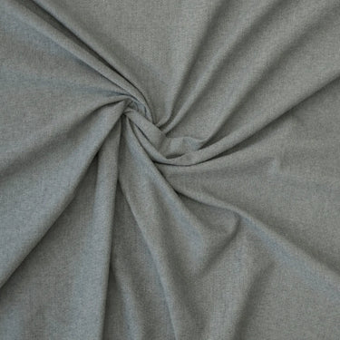 Khakifärgat Viktoria inredningstyg med jämn vävstruktur, fotograferat i snurr för att visa materialets fall