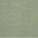Enfärgat Göran-tyg i mjuk pistagegrön nyans med linstruktur.