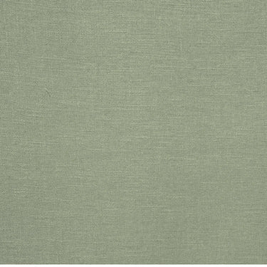 Enfärgat Göran-tyg i mjuk pistagegrön nyans med linstruktur.