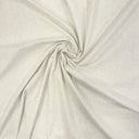 Gräddvitt Viktoria inredningstyg med mjuk struktur, fotograferat i snurr för att visa fall