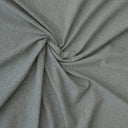 Khakifärgat Viktoria inredningstyg med jämn vävstruktur, fotograferat i snurr för att visa materialets fall